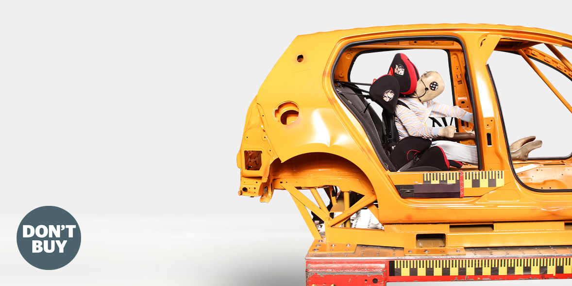 Sectioned view of an orange SUV body with a car seat inside, showcasing safety features. A child dummy is seated securely.