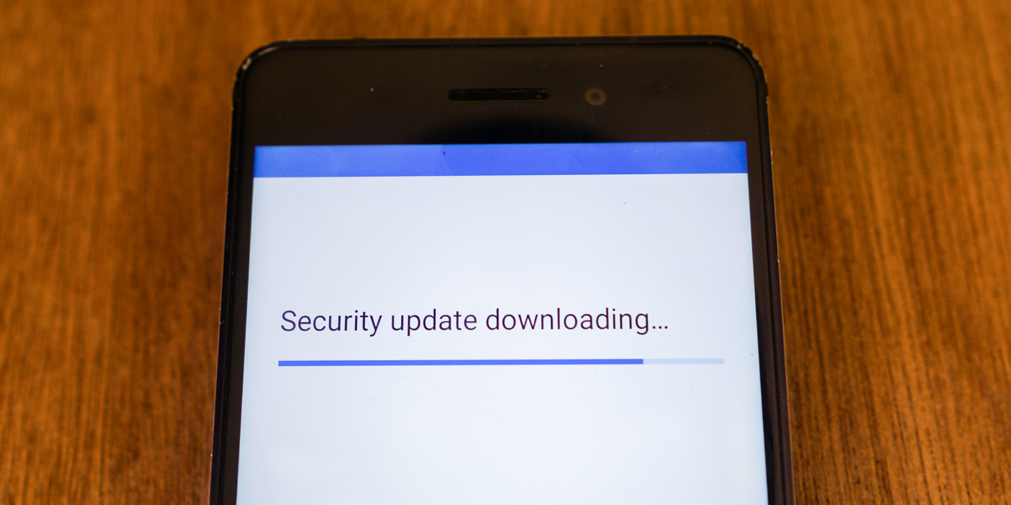 A phone downloading security updates