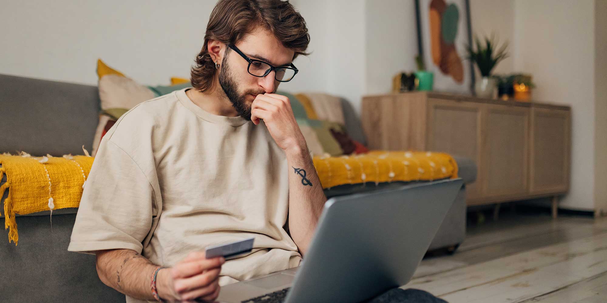 A holidaymaker pays for airport parking at home