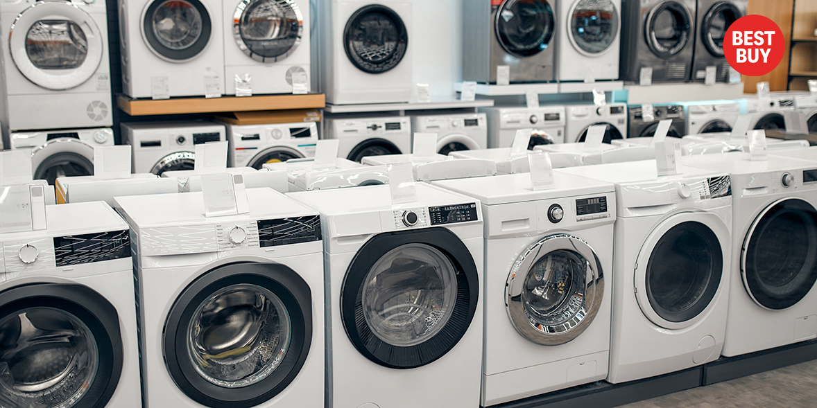 Rows of white washing machines displayed in an appliance store, featuring various brands and designs.